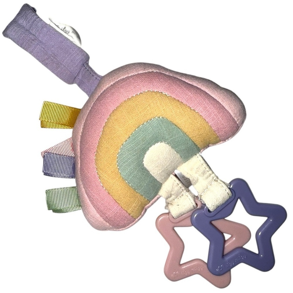 Itzy Ritzy Rainbow Plush Baby Toy with Star Teethers Pastel Sensory Tag Toy